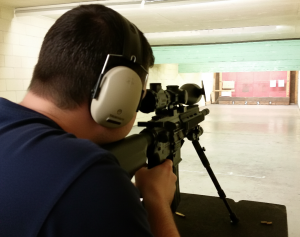 Precision shooting session focusing on firearm safety and handling
