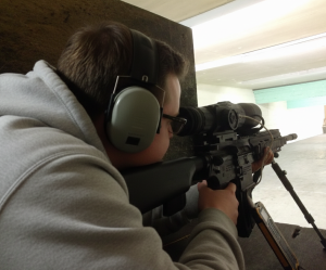Precision shooting session focusing on firearm safety and handling