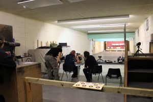 Precision shooting session focusing on firearm safety and handling