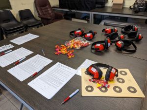 Historic rifle display with expert safety instruction